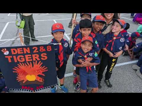 Year in review video preview with young scouts at a den event